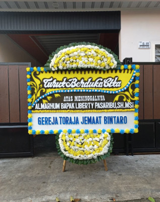Papan Bunga Duka di Palupi